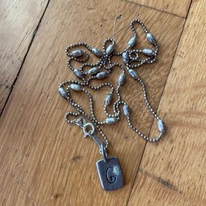 Sterling silver necklace with “G” pendant